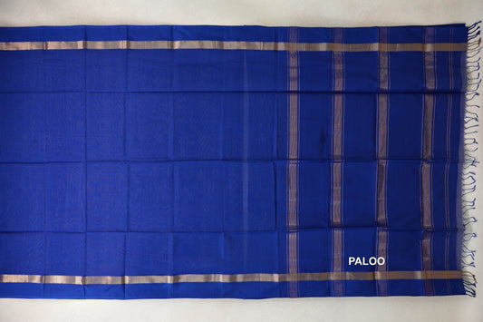 Deep Royal Blue Maheshwari silk cotton saree laid flat, showing a plain body, metallic-toned borders and a striped pallu with tassels.