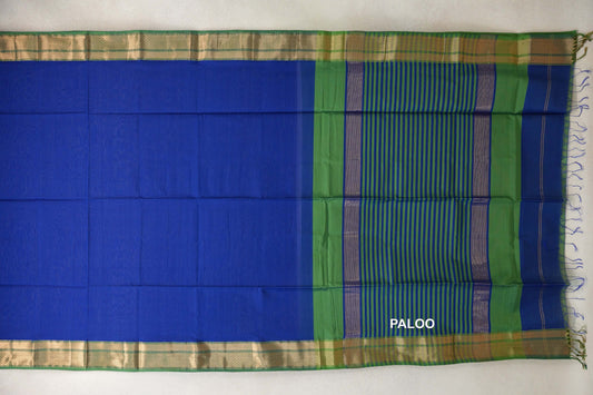 Spread-out Maheshwari silk cotton saree with a bright royal blue body, leaf green borders, and a striped blue-and-green pallu with fringe.