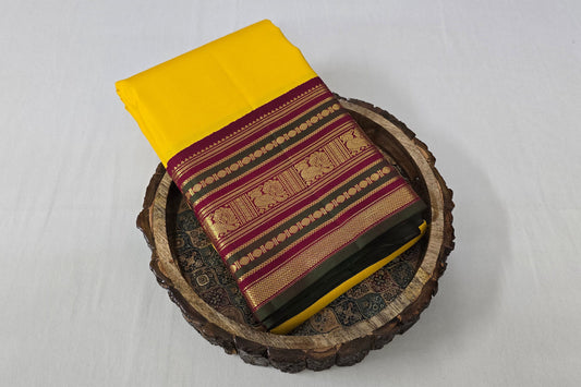 Plain lemon yellow Kanchipuram silk saree