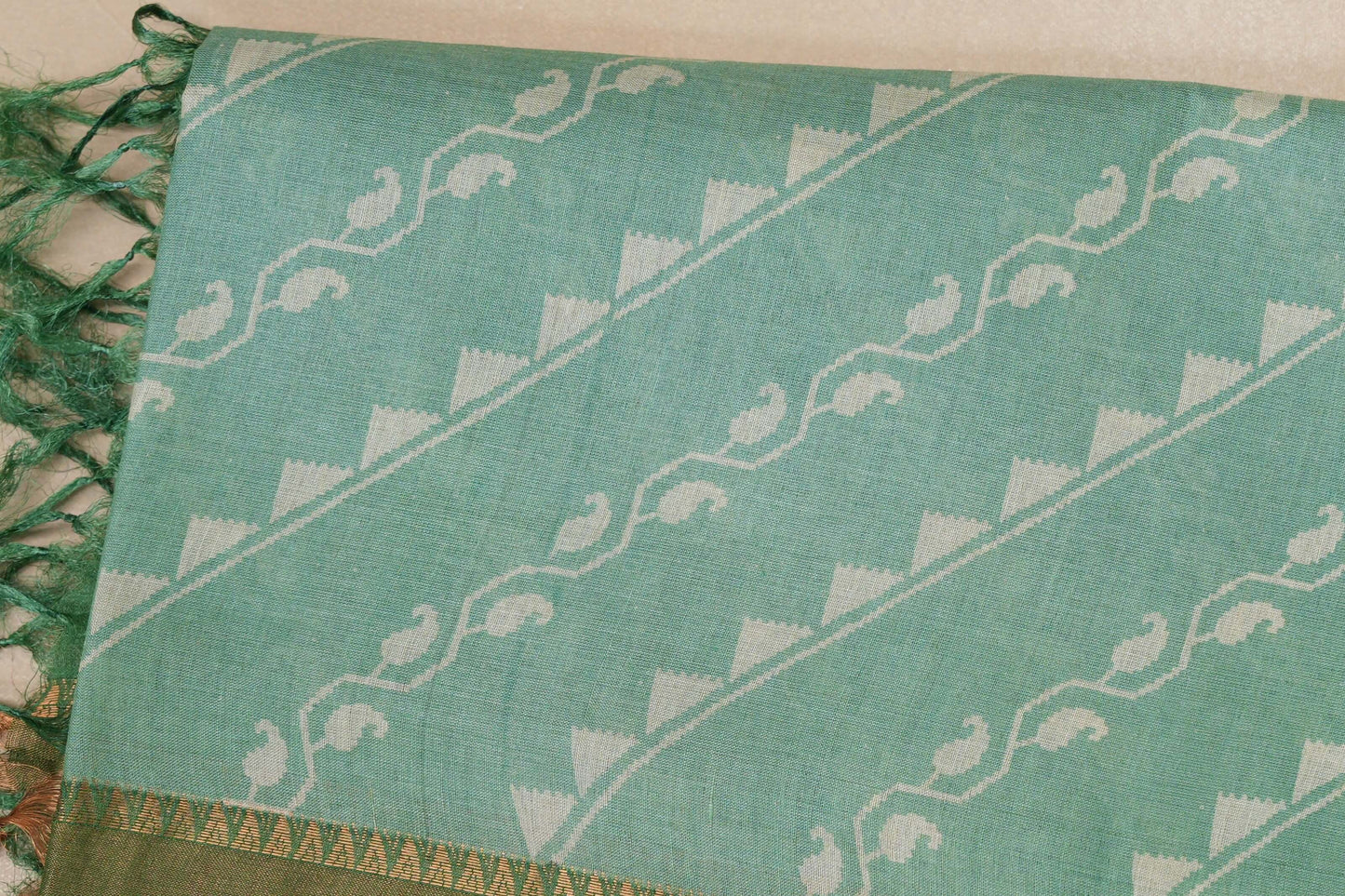 Light green with leaf green borders Tussar silk saree body