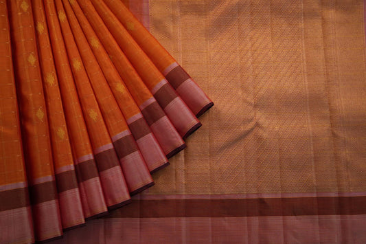 Rust orange kanchipuram silk saree
