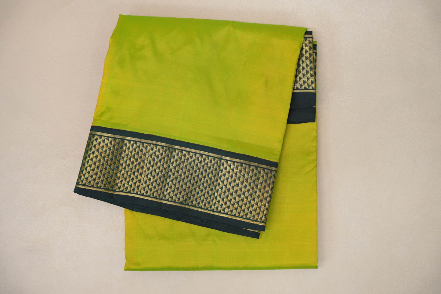 folded Fluorescent Green Ten Yards Silk Saree 