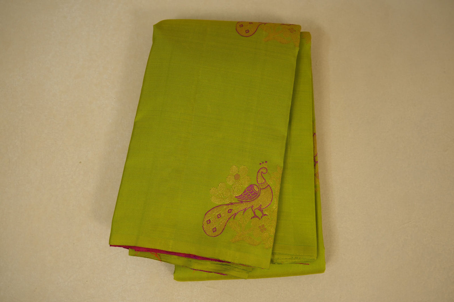 folded Parrot green vintage kanjivaram silk saree