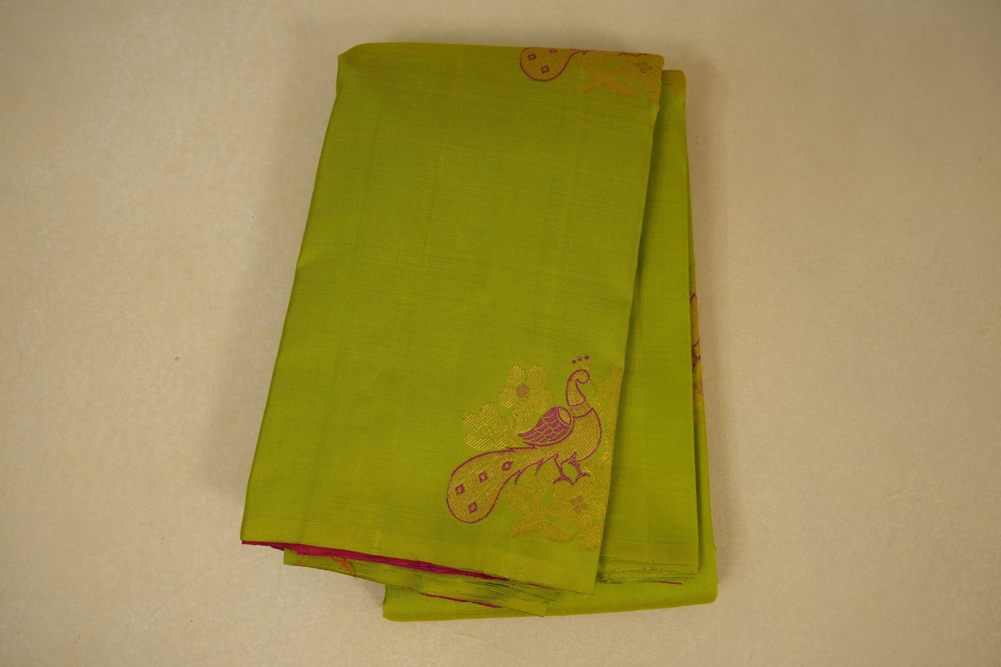 folded Parrot green vintage kanjivaram silk saree