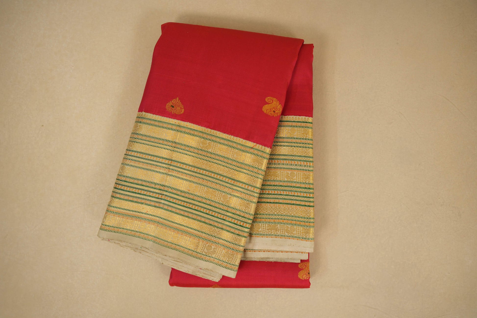 folded Red vintage kanjivaram silk saree