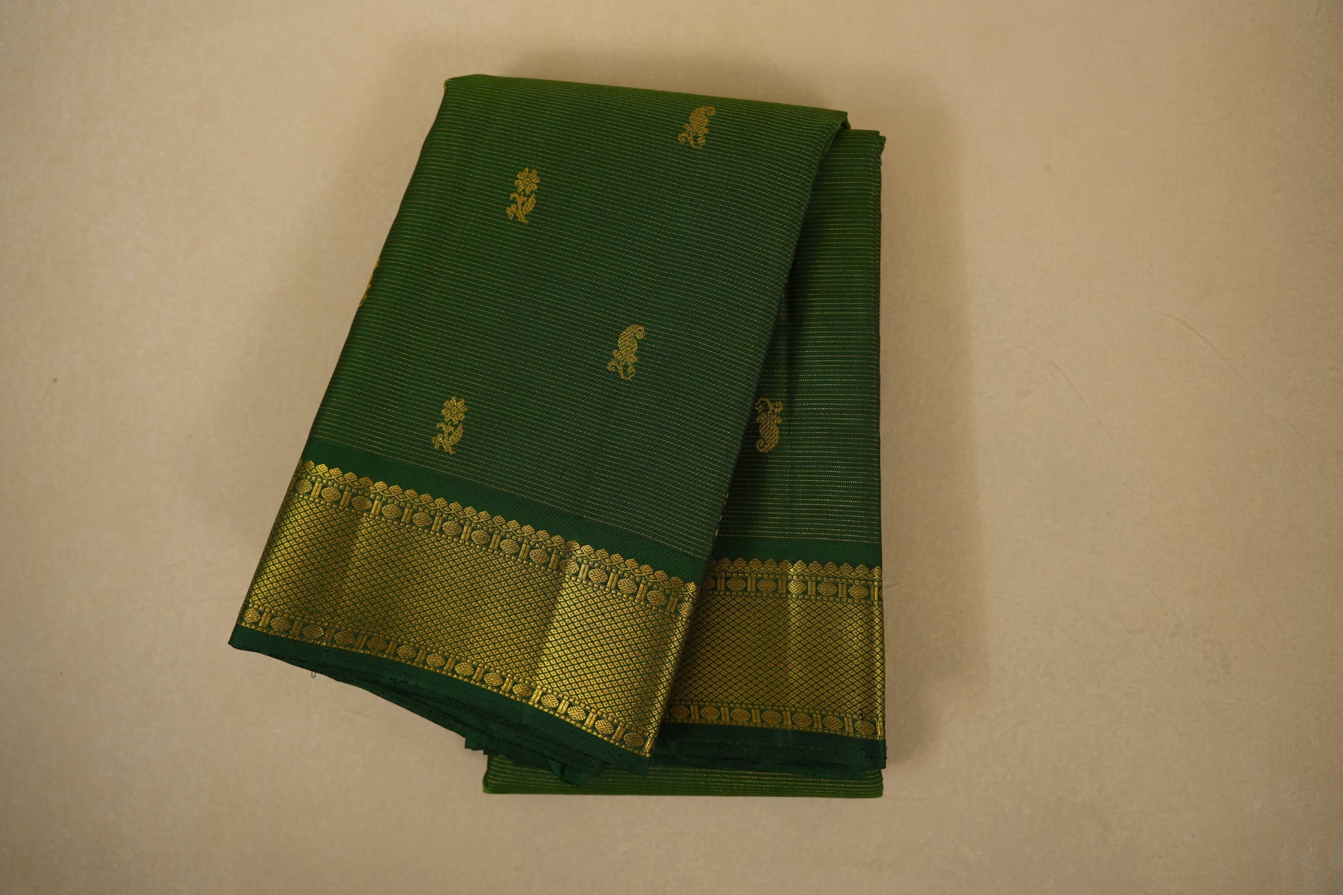 folded Dark green vintage kanjivaram silk saree
