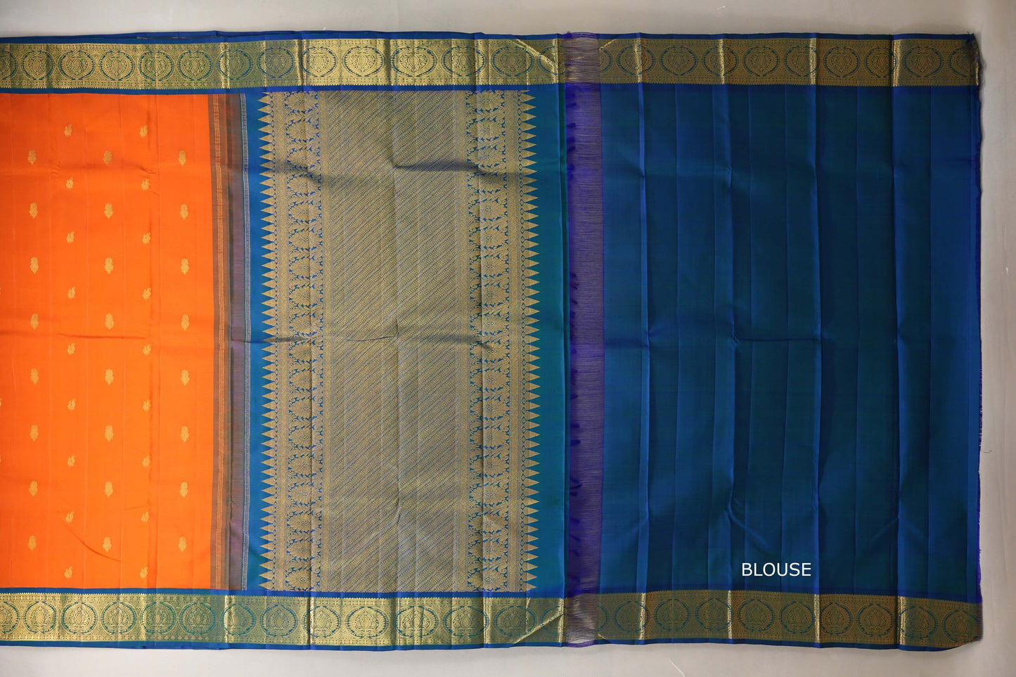 Bright orange with Peacock Blue borders Vintage Kanjivaram Silk Saree by Shreenivas Silk blouse