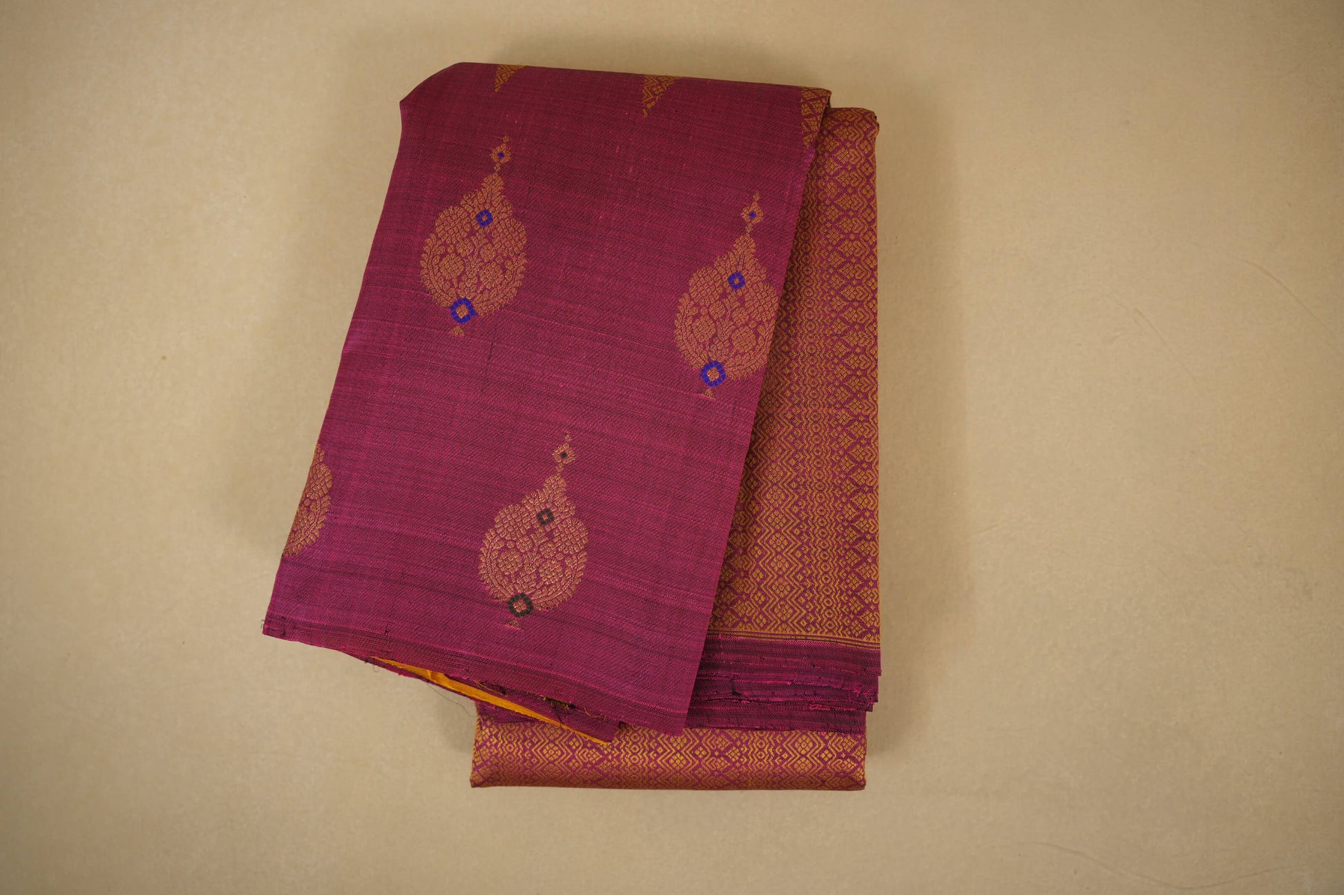 folded Magenta vintage kanjivaram silk saree