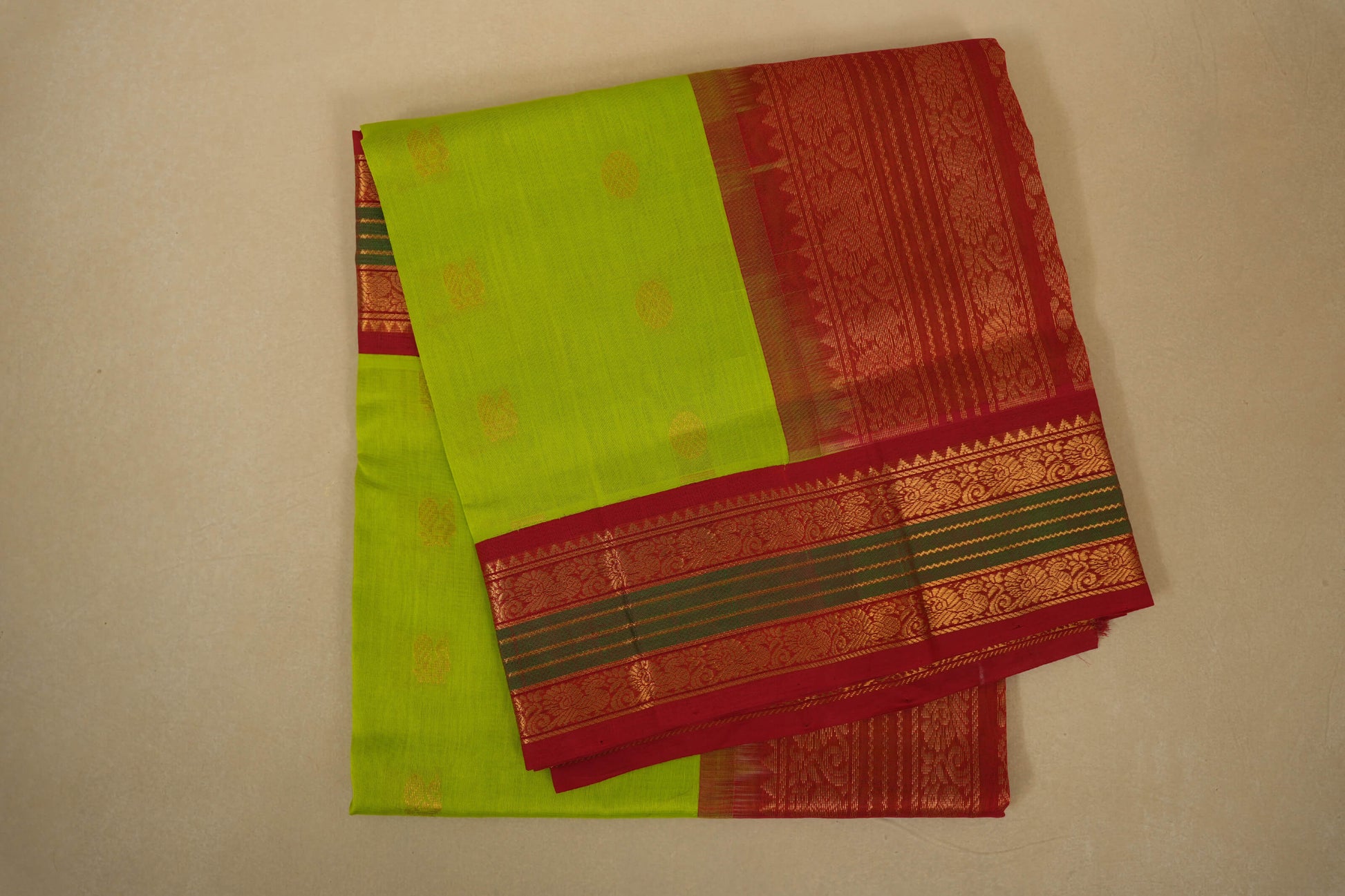 Folded Fluorescent green vintage silk cotton saree