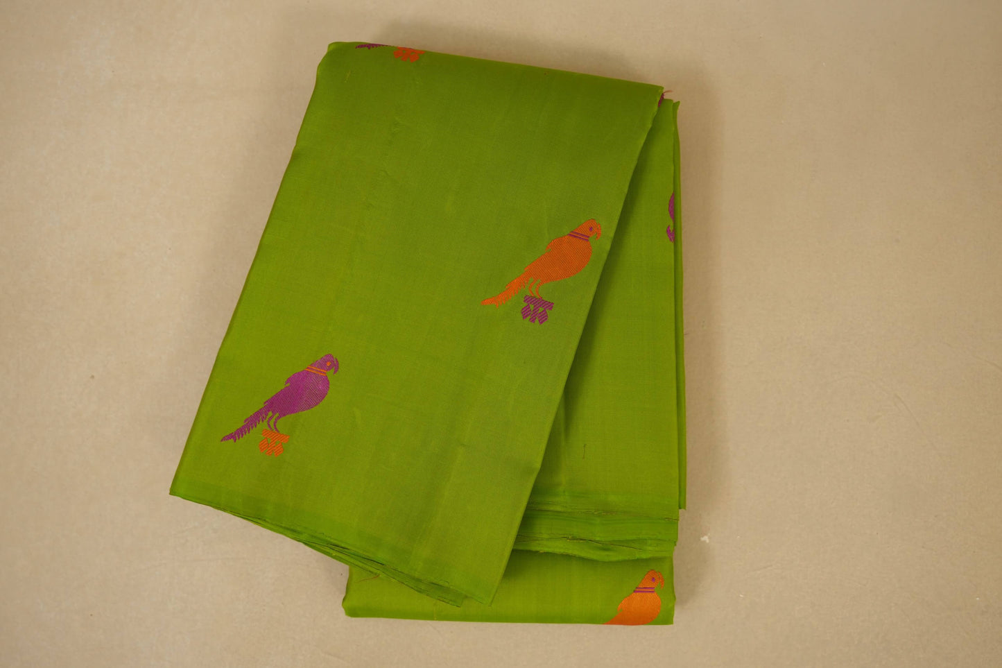 Parrot green folded vintage kanjivaram silk saree