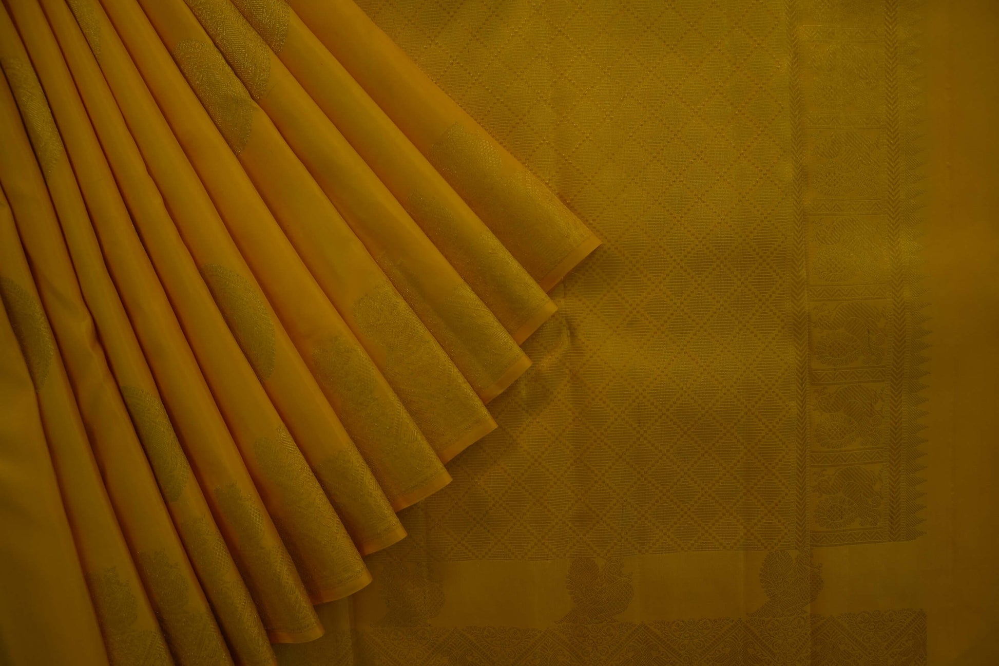 Bright yellow kanchipuram silk saree