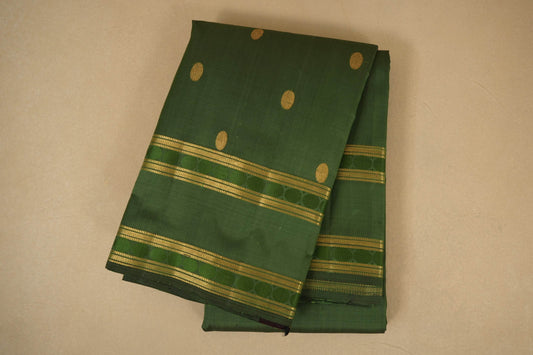 Moss green folded vintage kanjivaram silk saree