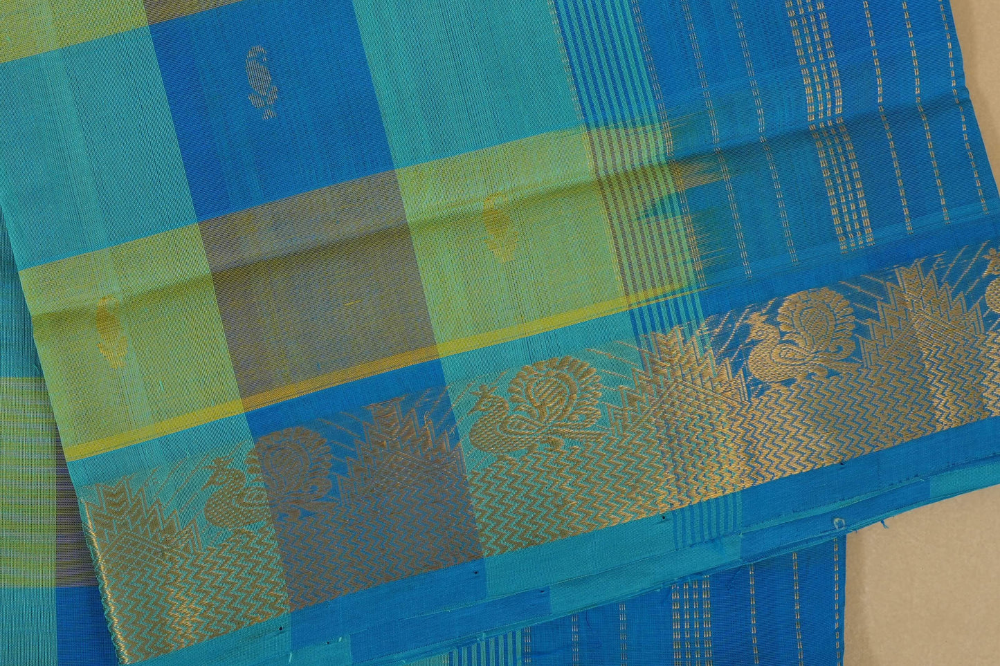 Multi color checks with sky blue paloo Nine and a half Yards Silk Cotton Saree border