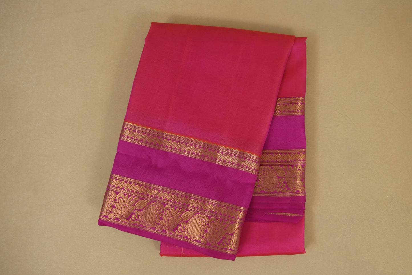 folded Peach Pink with Pink Borders Light Weight Kanchipuram Silk Saree