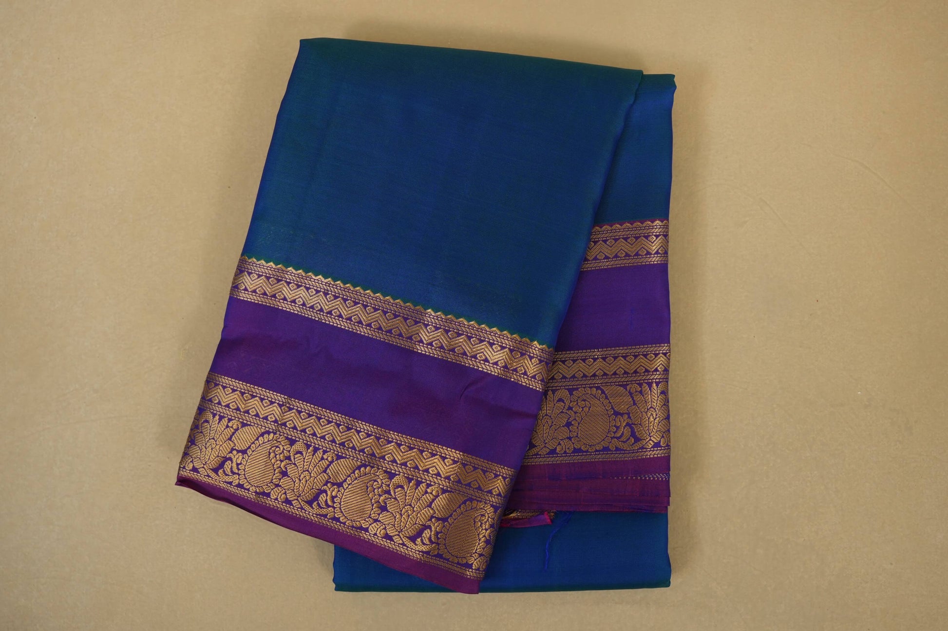 Folded  Peacock Green with Magenta Borders Light Weight Kanchipuram Silk Saree