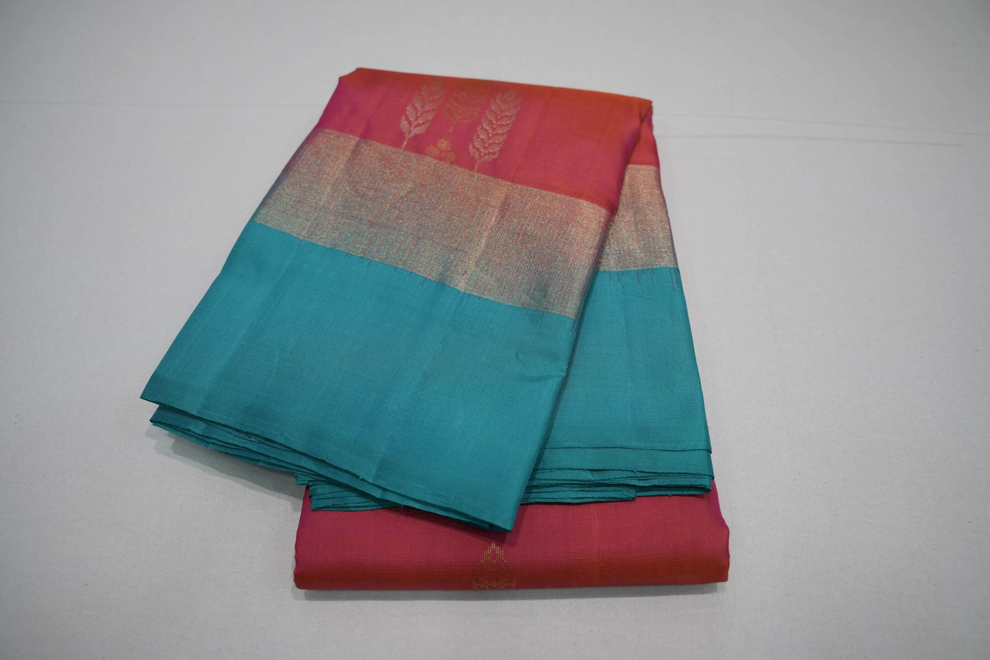 Pinkish orange kanchipuram silk saree