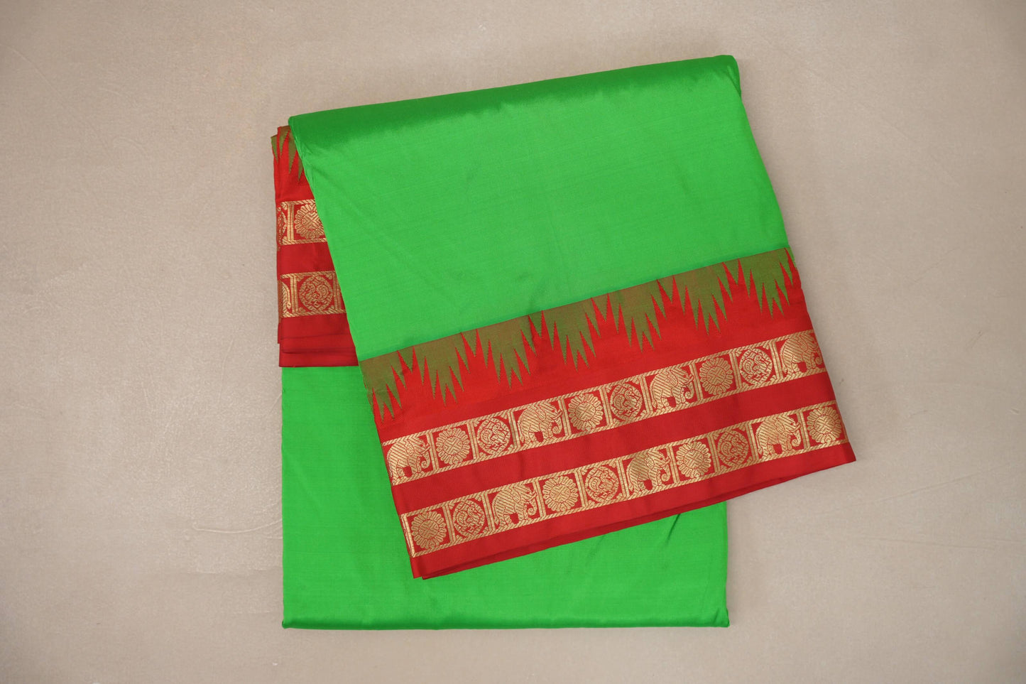 bright leaf green ten Yards Silk saree  folded 