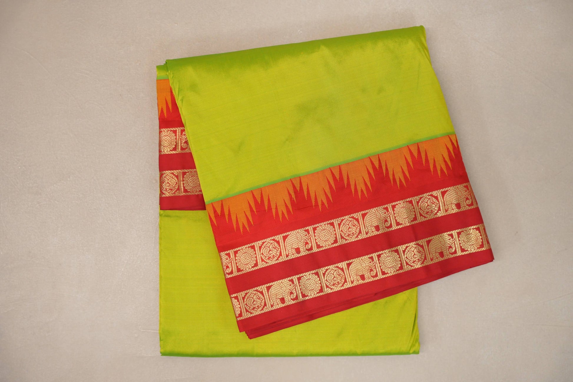 yellowish green Ten Yards Silk saree folded 