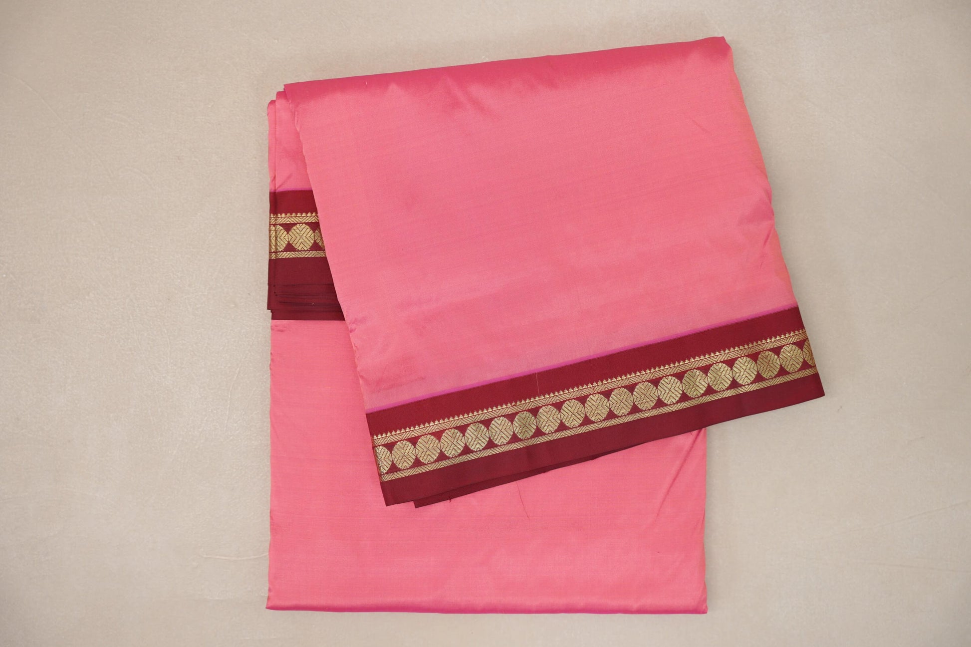 folded light rani pink Ten Yards Silk Saree  