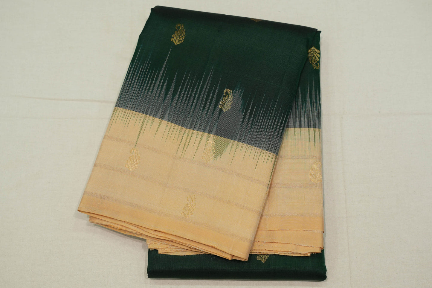 Dark green light weight kanchipuram silk saree