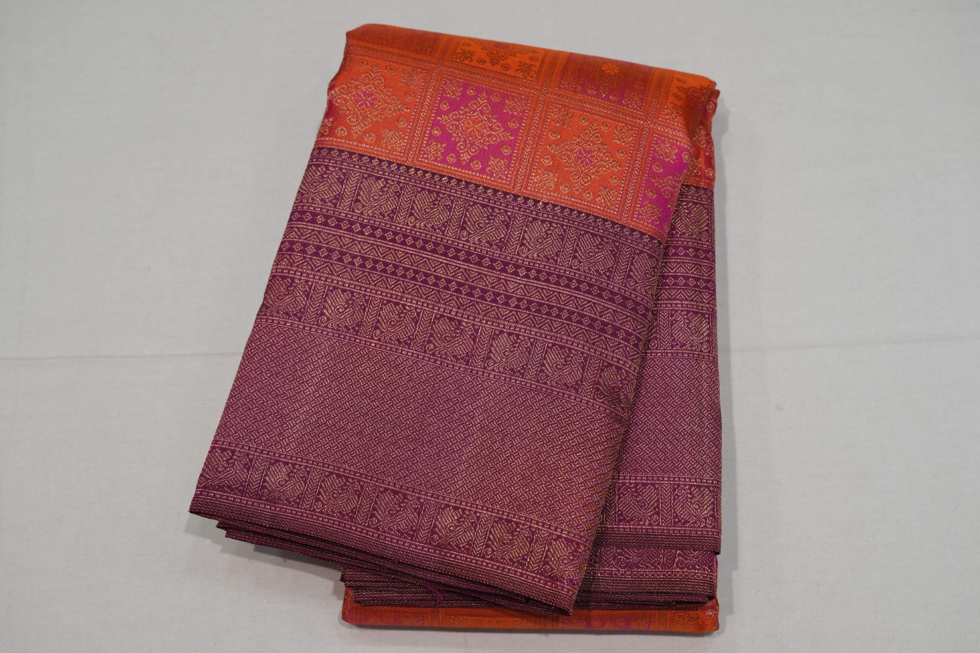 Pinkish orange bridal kanchipuram silk saree