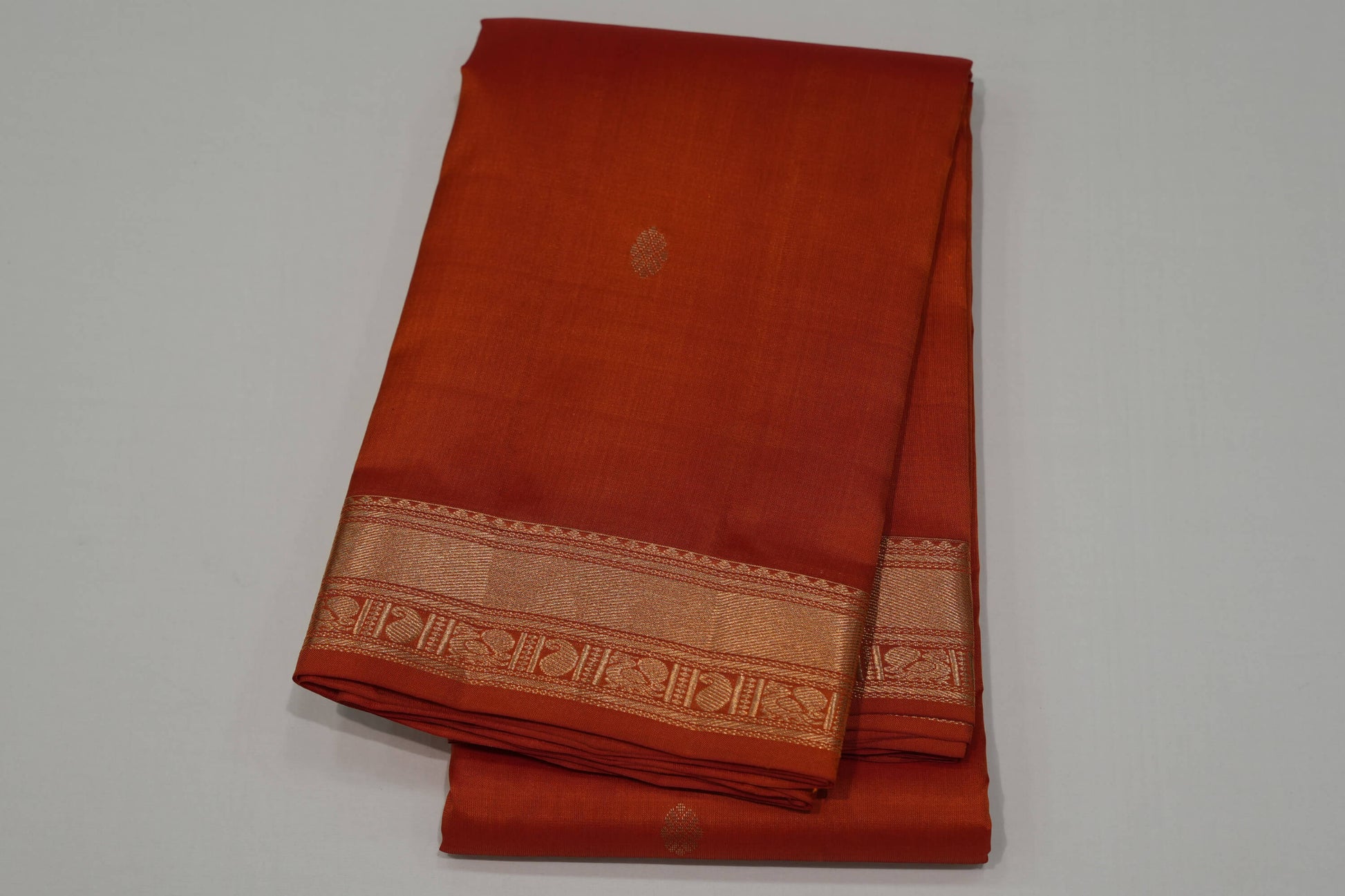 Rust orange light weight kanchipuram silk saree