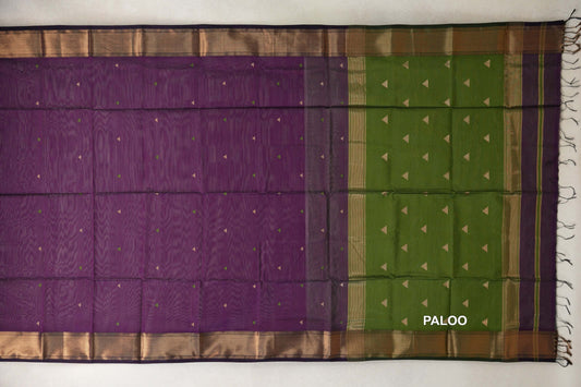 Deep Purple Maheshwari silk cotton saree laid flat, with small triangle motifs, zigzag-patterned borders and an Olive Green pallu with tassels.