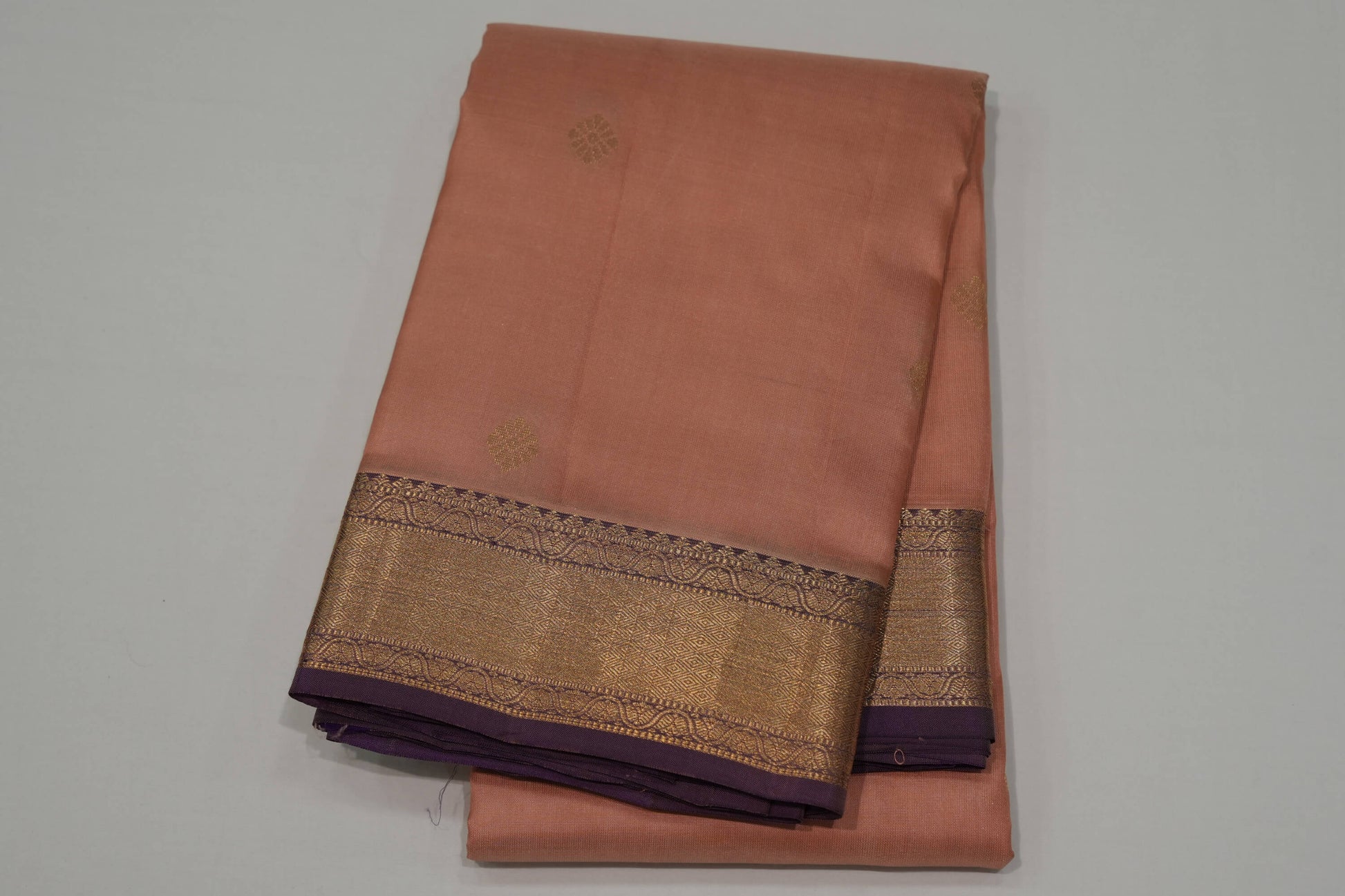 Beige light weight kanchipuram silk saree