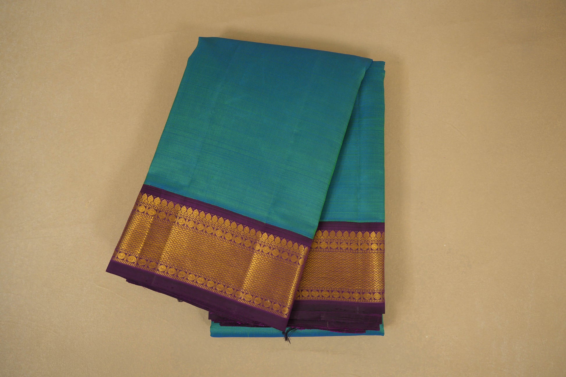 Folded Peacock Green with Purple Borders Vintage Kanjivaram Silk Saree 
