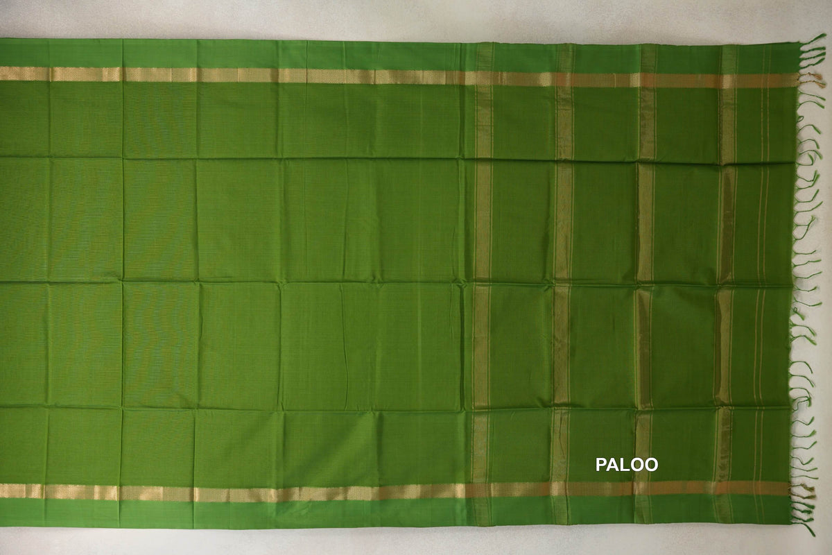 Leaf Green Maheshwari silk cotton saree spread out, with a plain body, gold-striped borders and a striped pallu with fringe on the right.