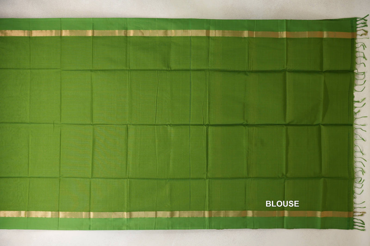 Leaf Green Maheshwari silk cotton blouse fabric laid flat, with a plain center, narrow gold-toned bands along the edges and green fringe.