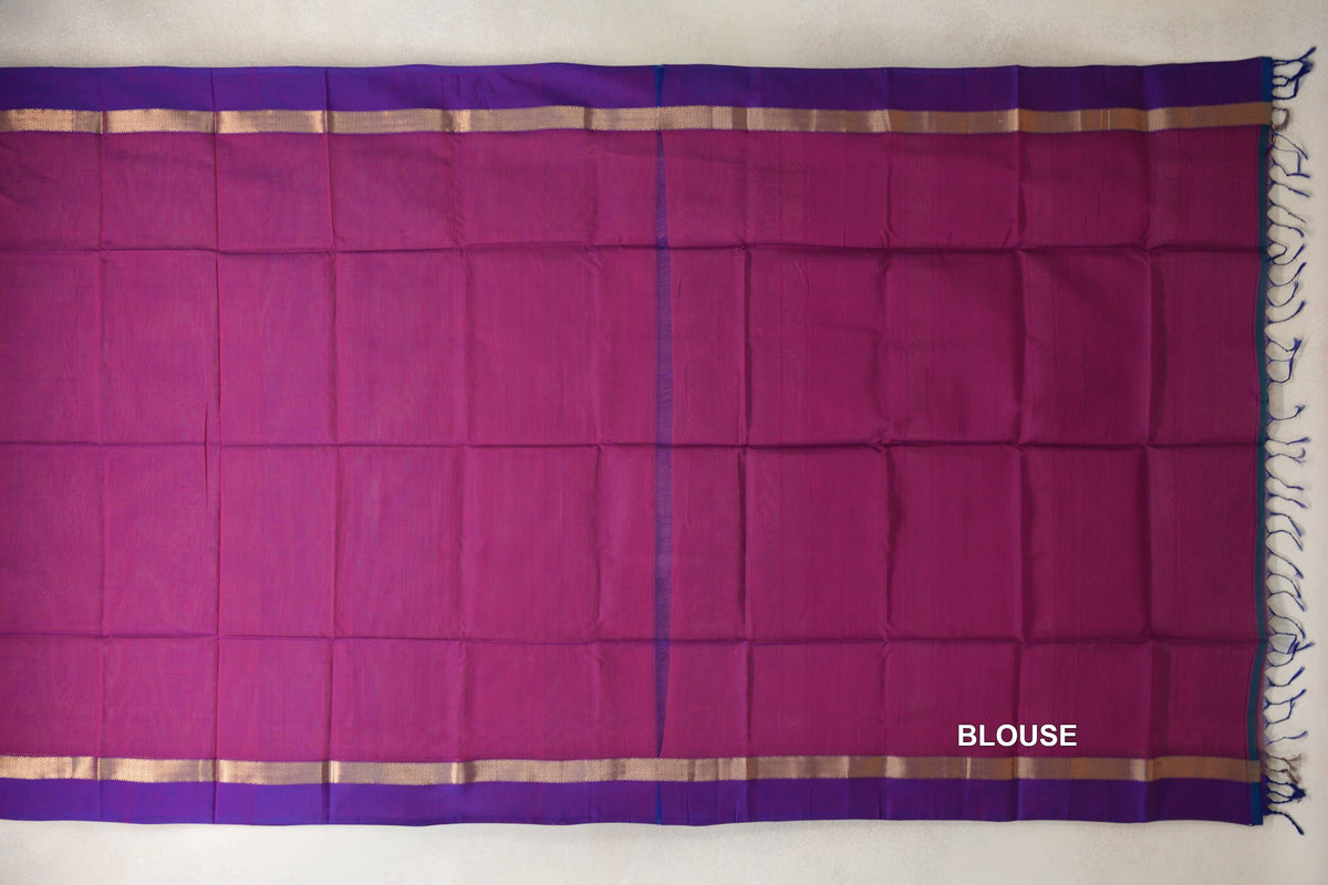 Deep Magenta Maheshwari silk cotton blouse piece laid flat, with Violet Purple borders, narrow gold-toned stripes and tassels at one end.