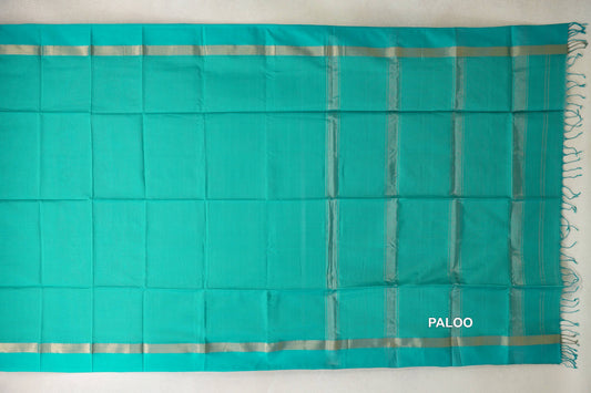 Bright Aqua Green Maheshwari silk-cotton saree spread flat, with silver-toned borders and a striped pallu ending in tassels.