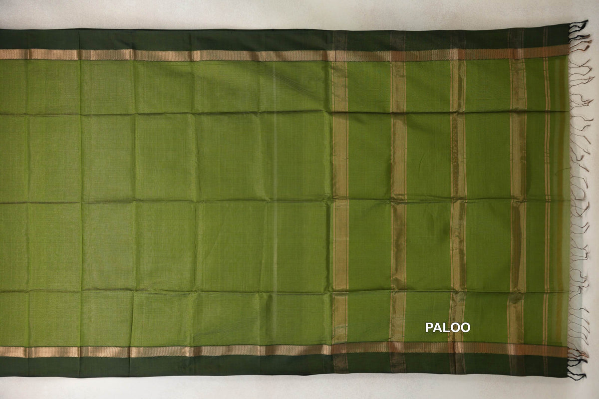 Maheshwari silk cotton saree spread flat, with an olive green body, deep forest green borders, and a striped pallu with tassels.