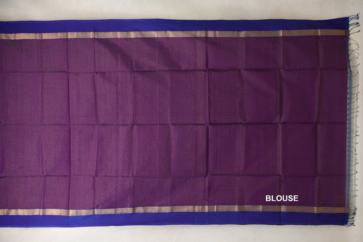 Blouse section of a deep purple Maheshwari silk cotton saree laid flat, with violet purple borders, fine metallic-looking bands and tassels at one end.