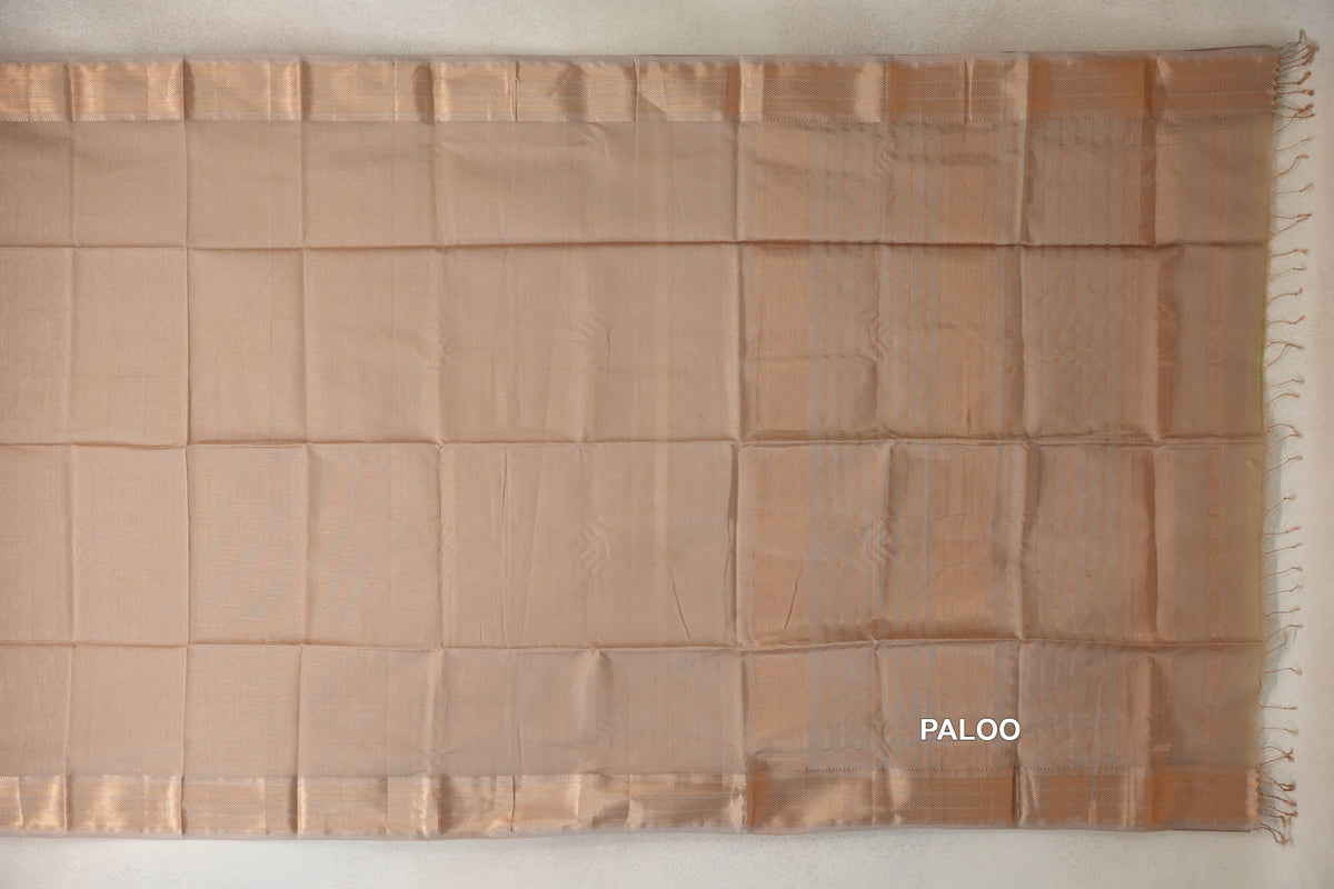 Dark Sandal Beige Maheshwari silk cotton saree laid flat, showing a plain body, striped pallu, woven borders and a fringed end.