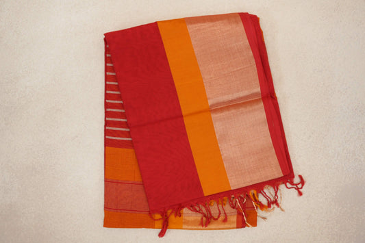 Folded Maheshwari silk cotton saree with a finely striped tomato red panel, deep orange and pale peach bands, a red edge and fringed end.