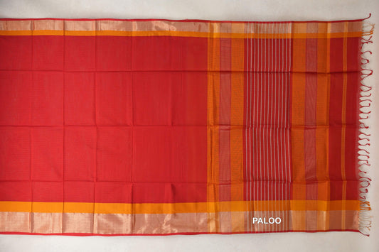 Maheshwari silk cotton saree spread flat, with a plain tomato red body, deep orange borders and a striped Multi Color pallu with tassels.