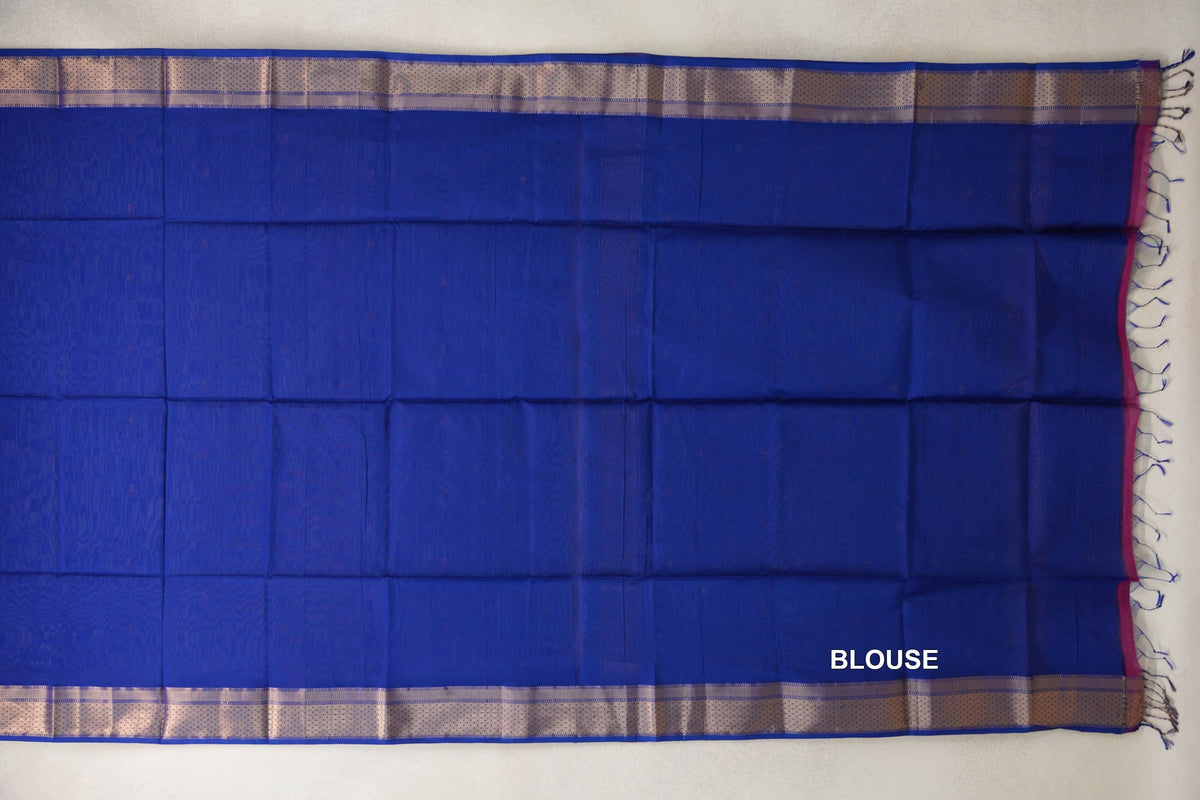 Bright Royal Blue Maheshwari silk cotton blouse piece laid flat, with silver-toned patterned borders and tassels along one edge.