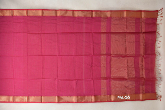Bright magenta Maheshwari silk cotton saree pallu laid flat, with fine checks, striped panels, shimmering borders and tassels along one end.