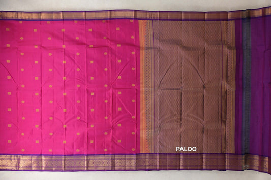 Lightweight Kanchipuram silk saree spread out, with a rani pink body, small gold motifs, magenta purple borders and a lattice-patterned pallu.