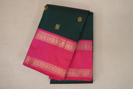 Deep Bottle Green with Orangish Pink Rettai Pettu Borders Vintage Kanjivaram Silk Saree