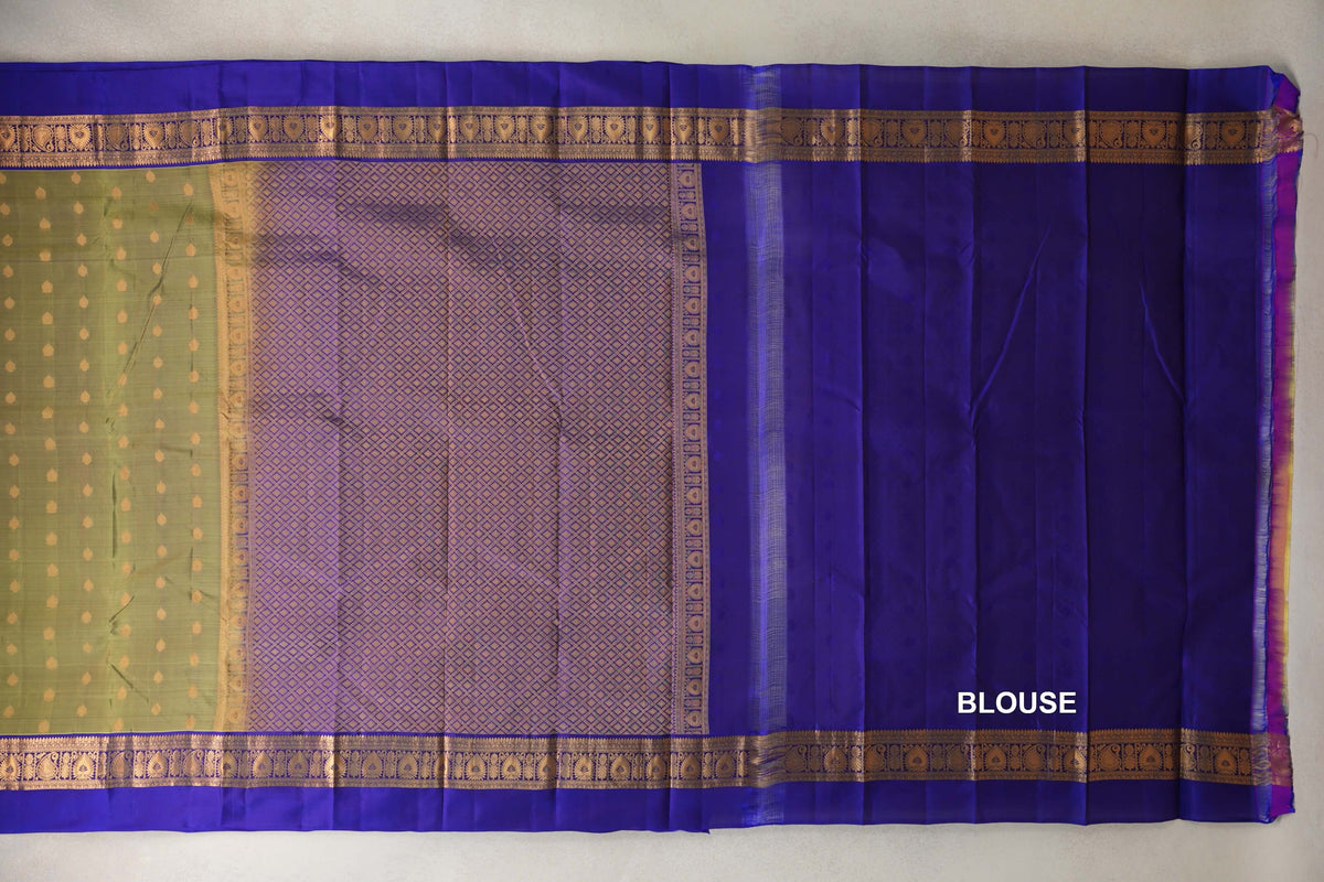 Laid-out lightweight Kanchipuram silk saree showing an olive green dotted body, a gold lattice pallu, and royal purple borders and blouse fabric.