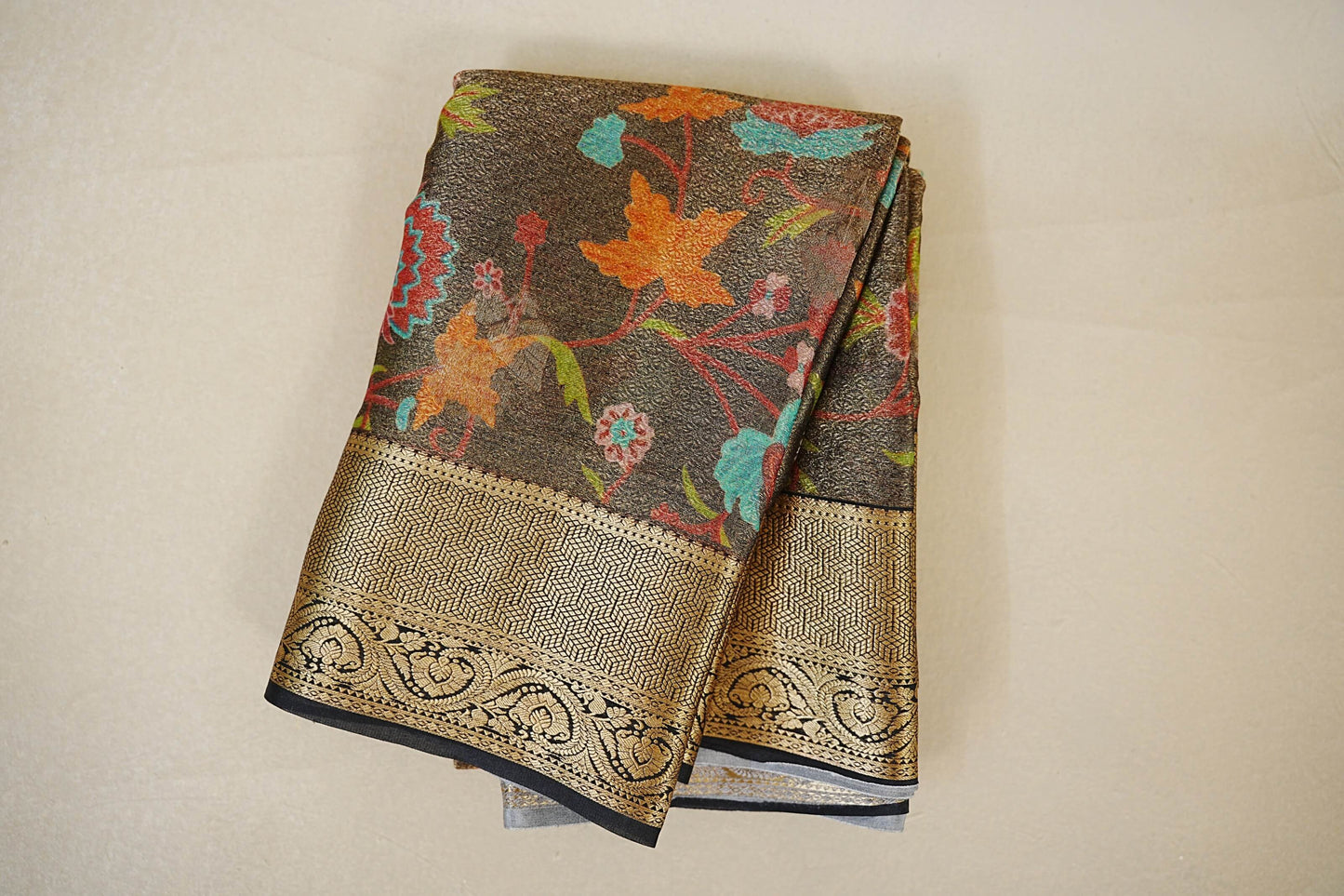 Folded Charcoal Brown with Multi Color Floral with Black Borders Mysore Silk Saree