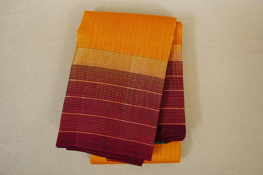folded Mango Yellow with Deep Maroon Borders Light weight Kanchipuram Silk Saree