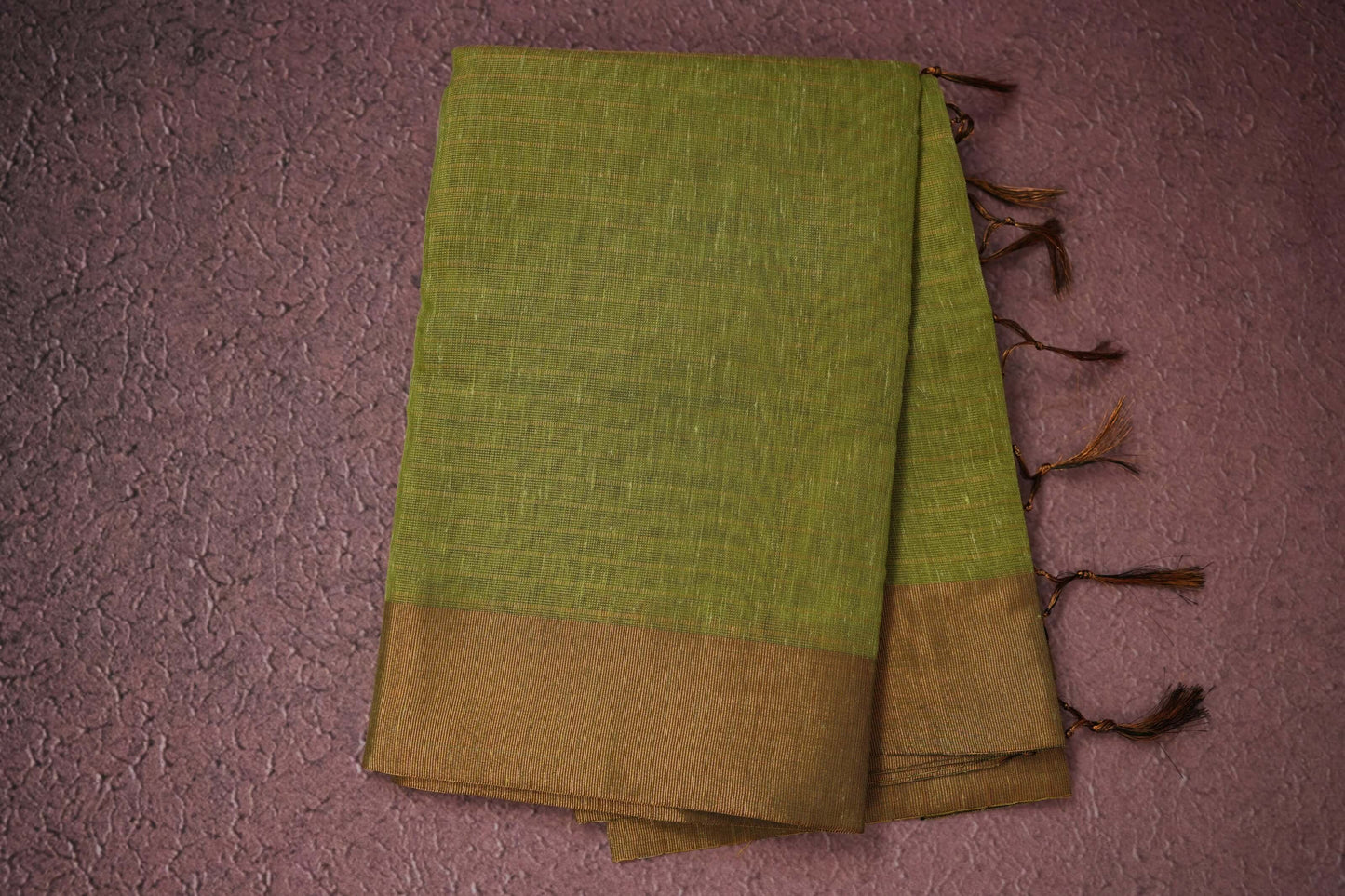 mild green semi linen saree