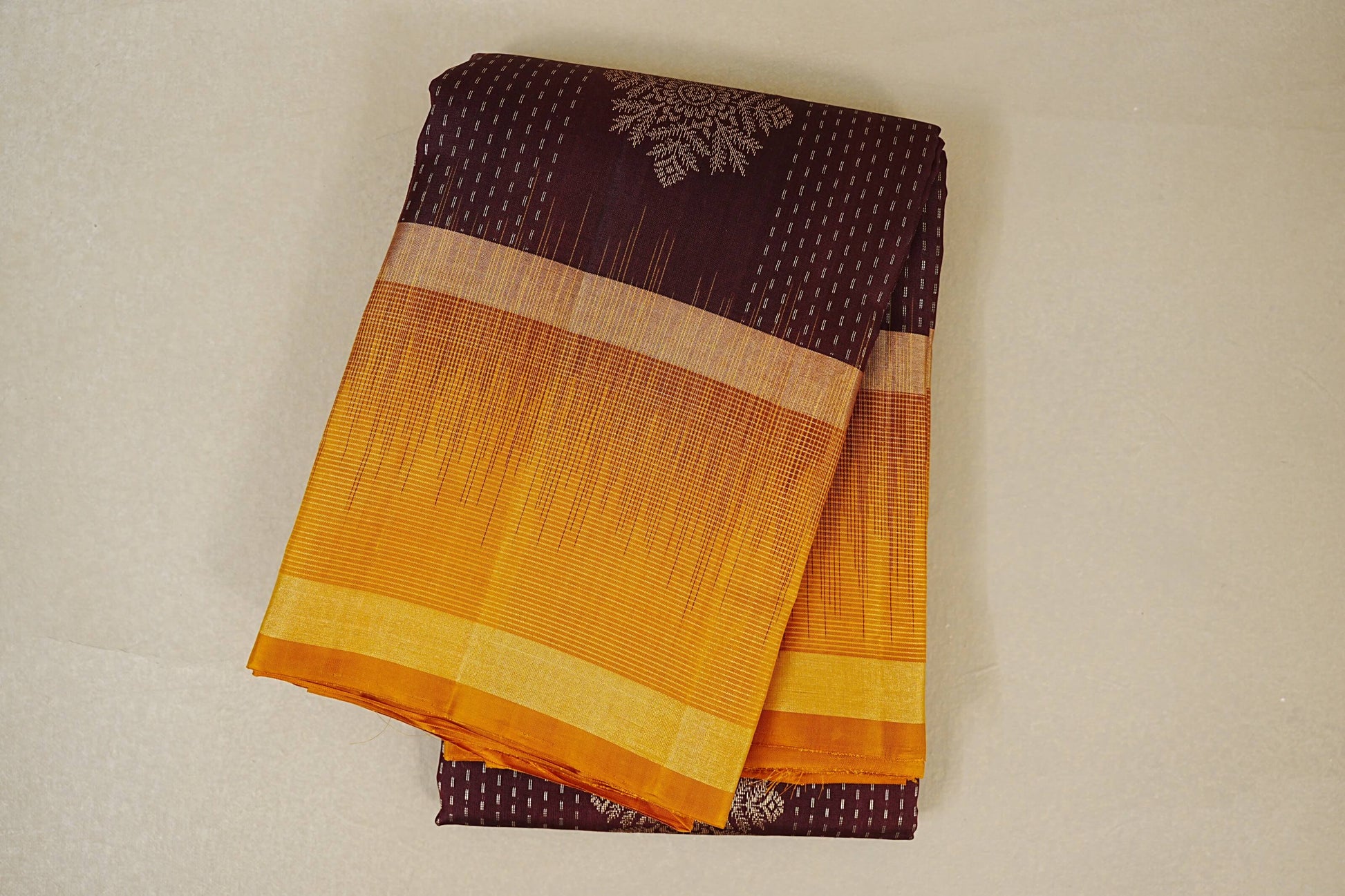 folded Brownish Maroon Light Weight Kanchipuram Silk Saree