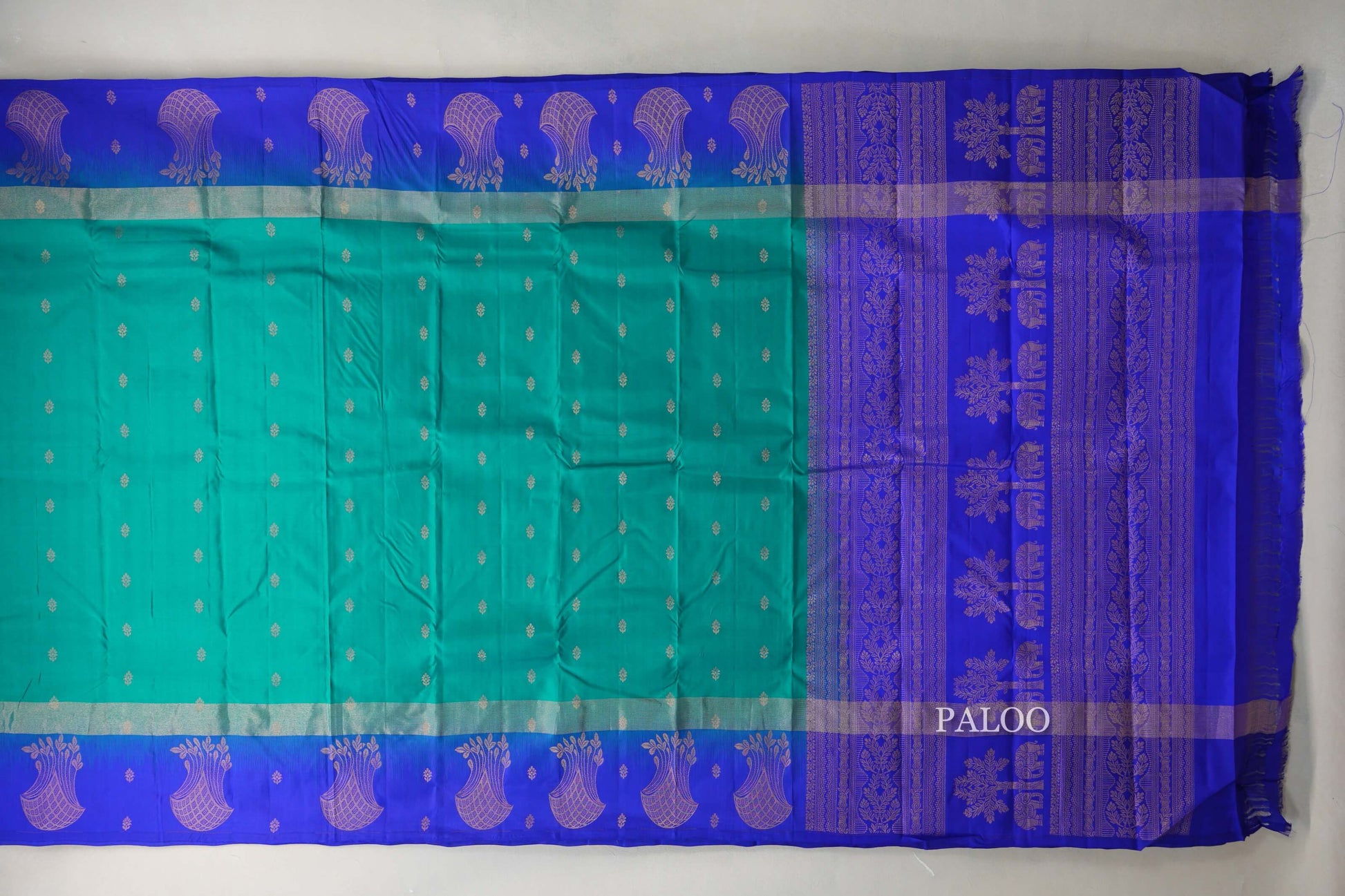 Peacock green with Deep Blue borders Light Weight Kanchipuram Silk Saree paloo