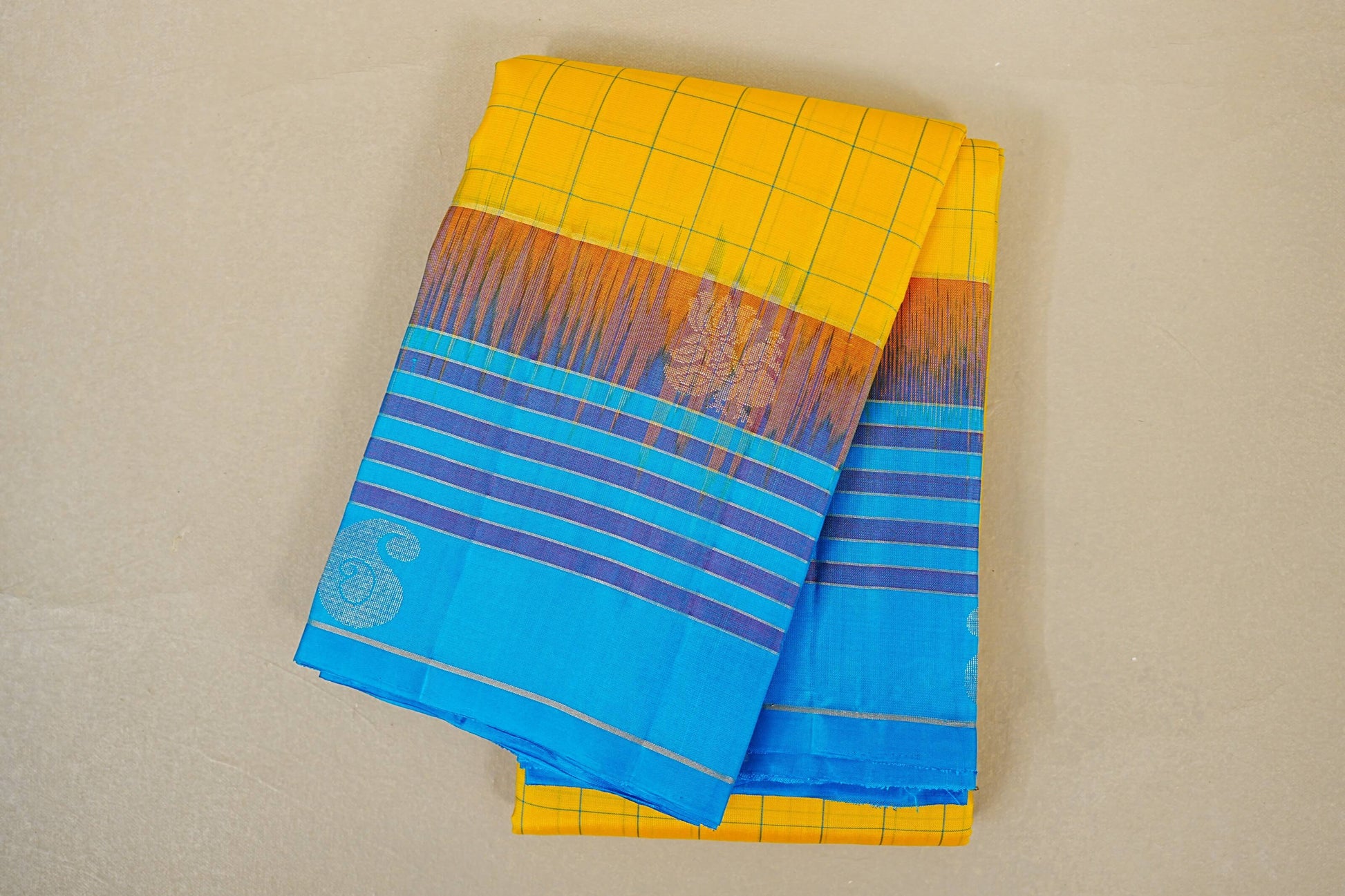 folded Bright Yellow Light Weight Kanchipuram Silk Saree