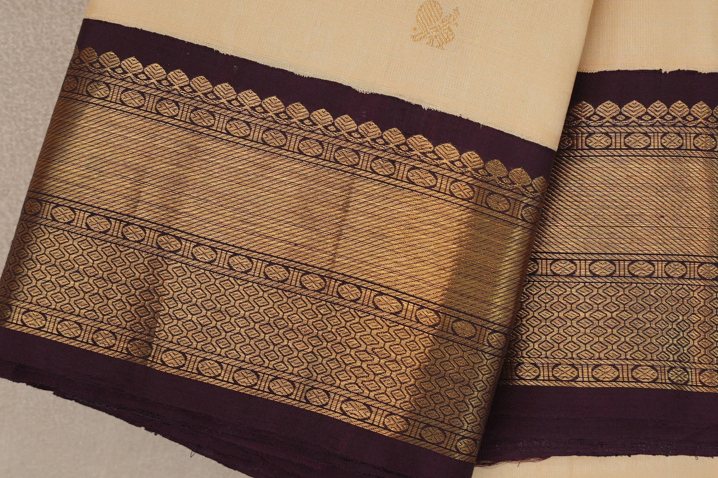 Sandal cream with Deep Plum borders Plant based Kanjivaram Silk Saree border 